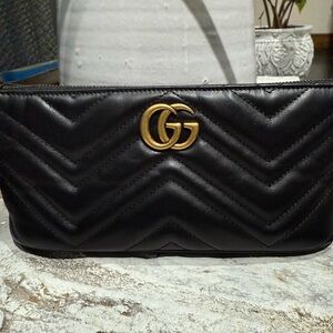 Gucci Black Quilted Leather Pouch with Gold Emblem